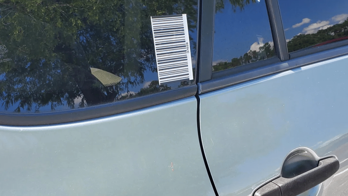 So many cars in Florida have barcodes on the window, all for an ...
