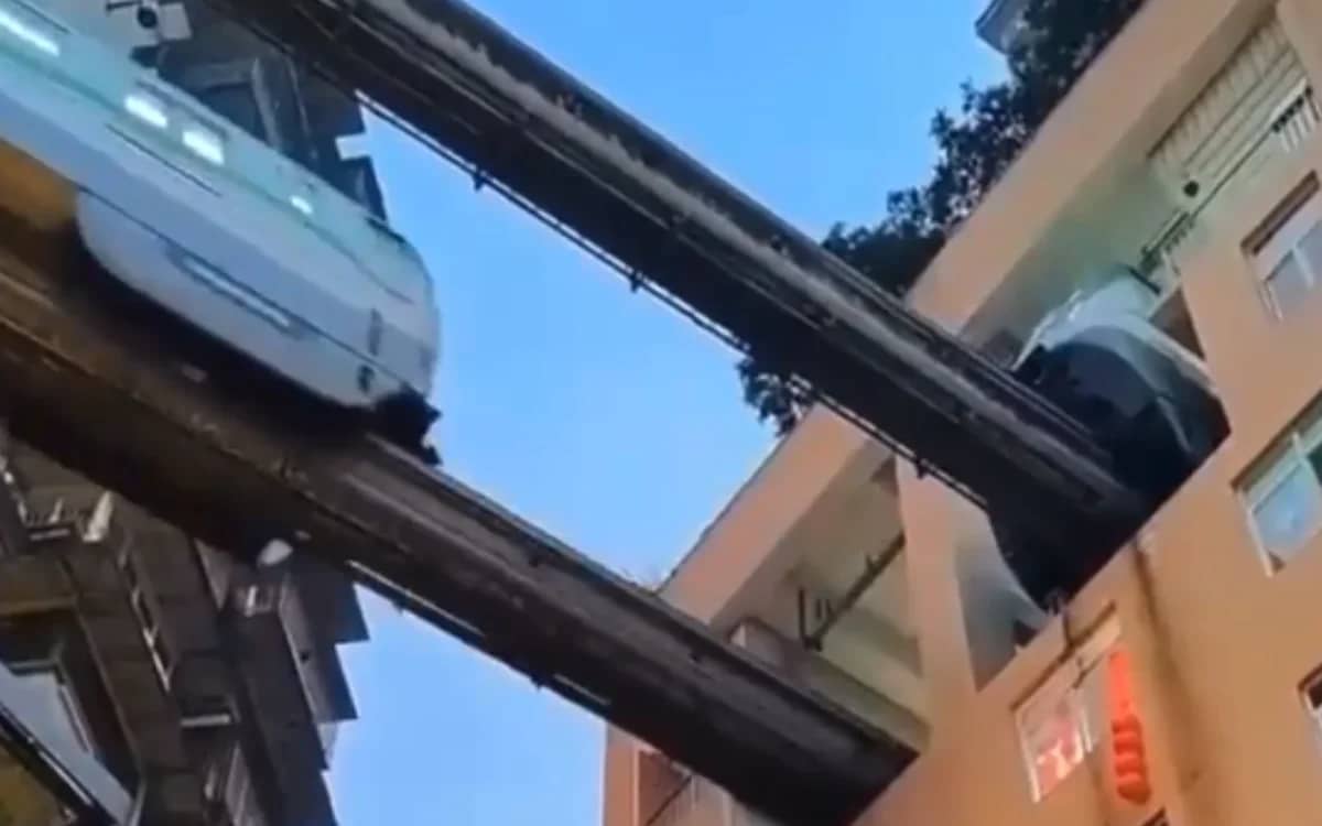 apartment-block-railway-through-china