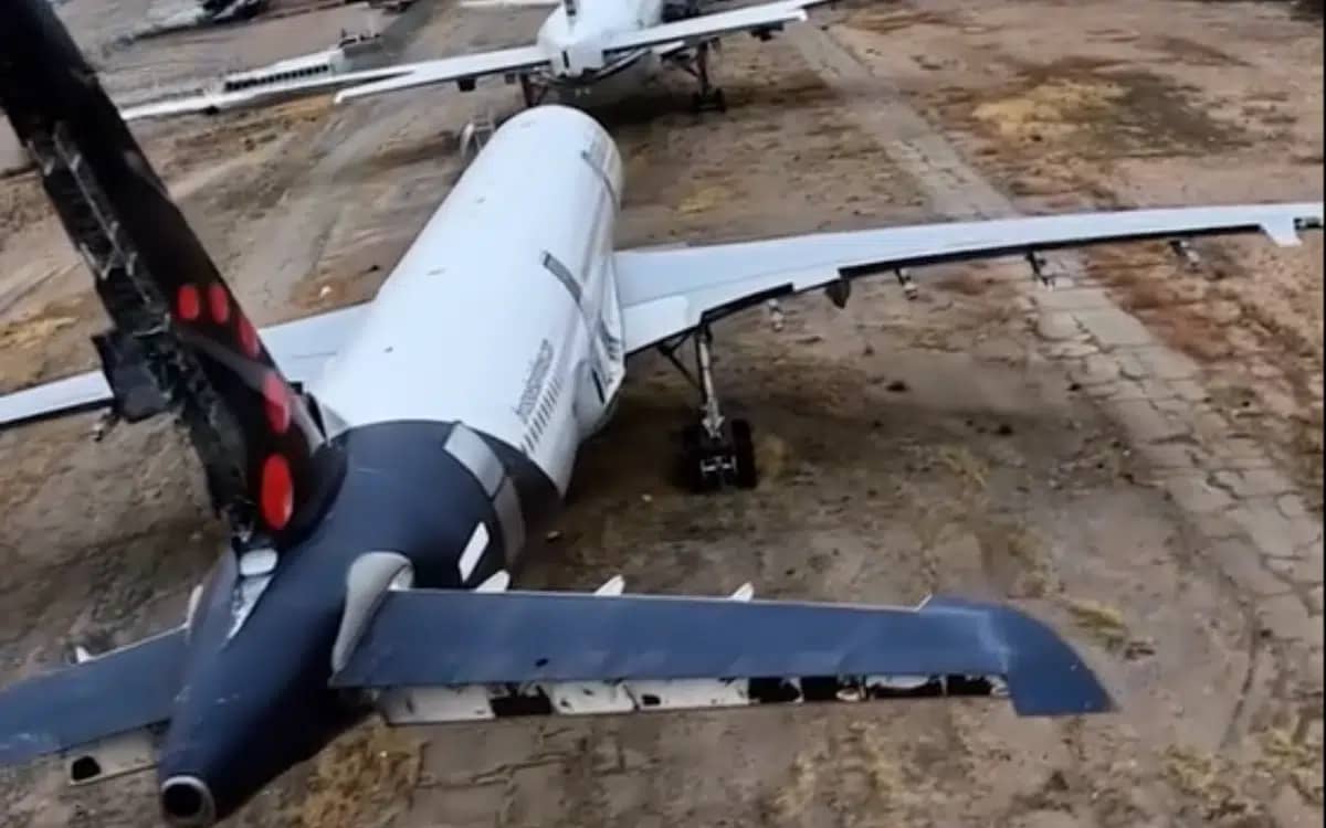 flying-over-plane-graveyard-abandoned-planes