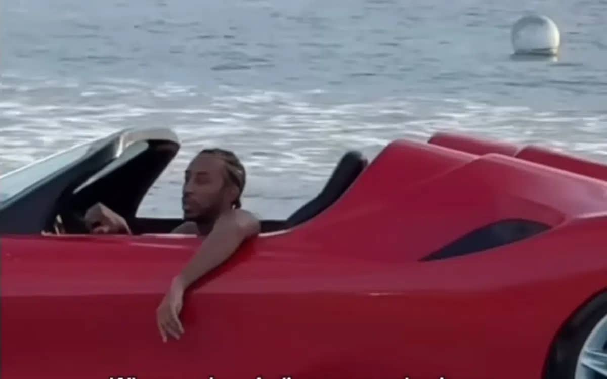 ludacris-drives-a-ferrari-boat-at-the-beach