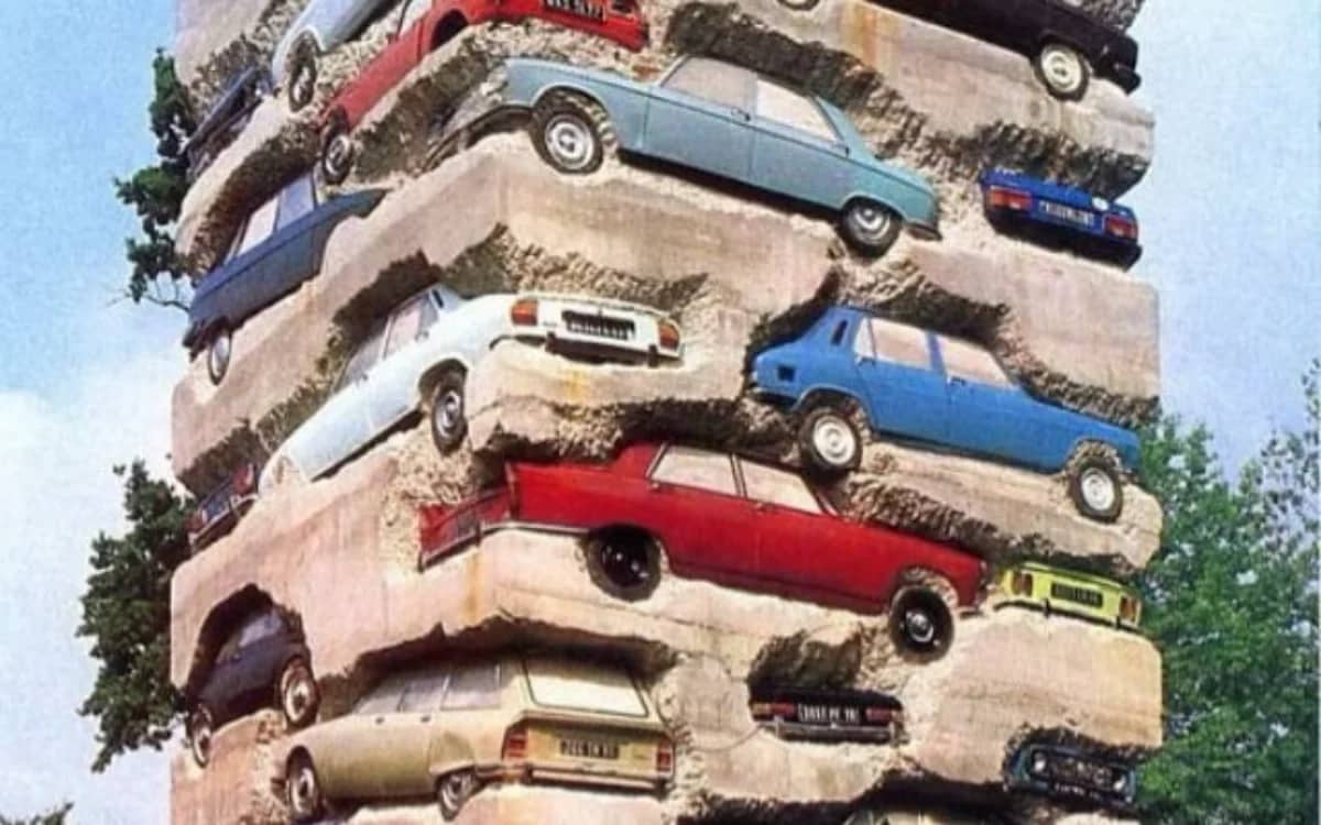 cars-stacked-in-concrete-tower-french-sculpture