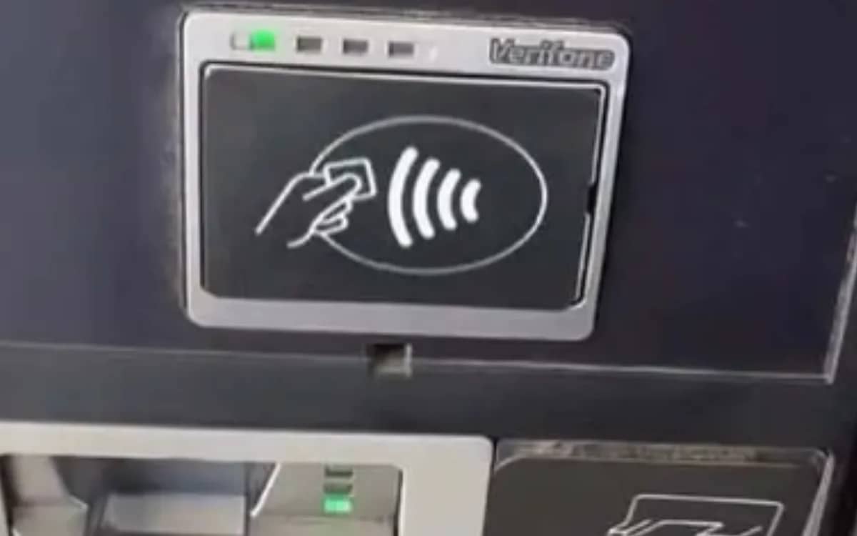 us-man-sticker-card-reader-gas-credit-card-scam-warning