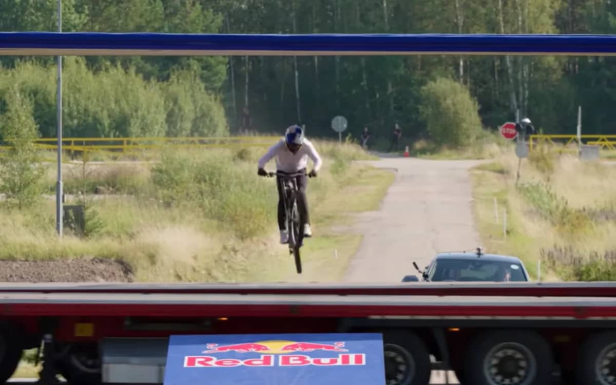 red-bull-daredevil-attempts-impossible-gap-one-second-jump-between-two-trucks