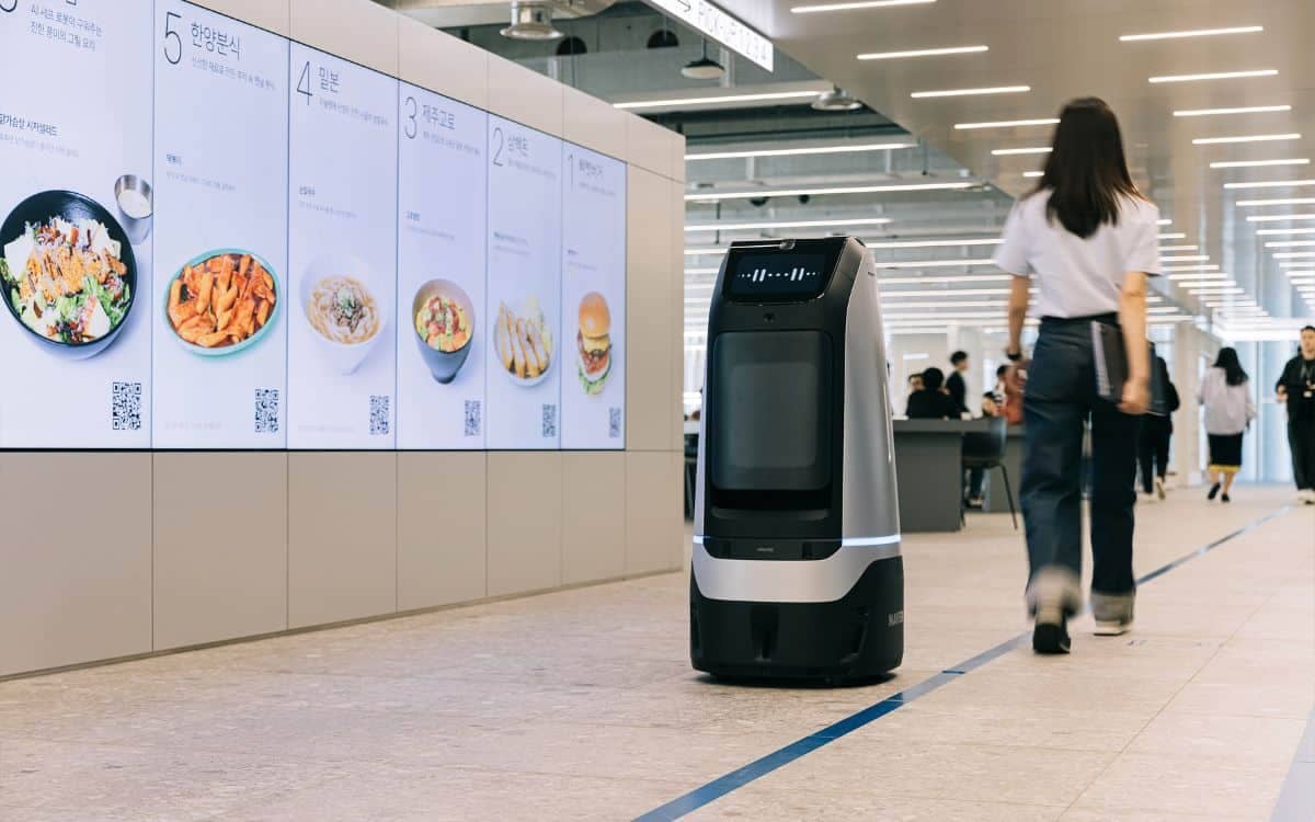 Robots roam freely at this 28-story robot-friendly building