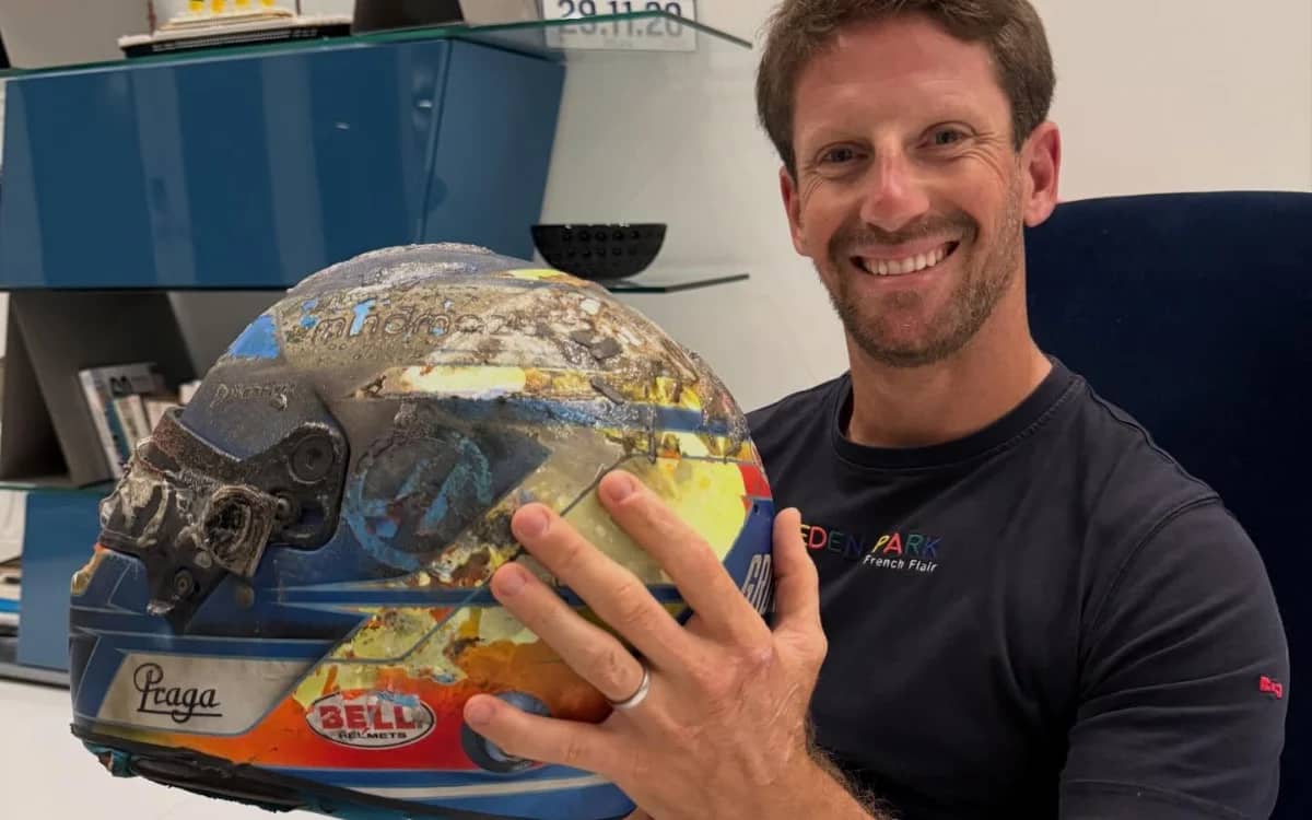 romain-grosjean-reunited-melted-formula-1-helmet-saved-his-life