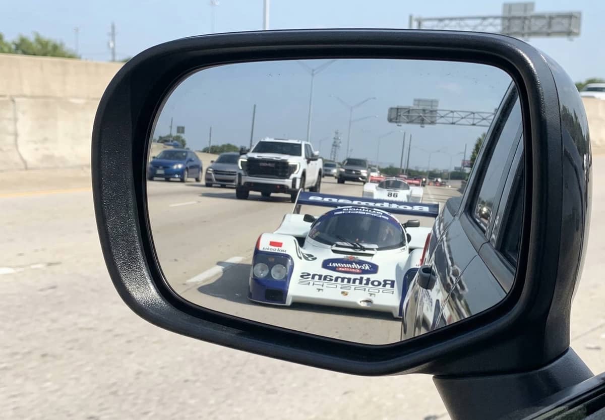 porsche-962-le-mans-race-car-highway-traffic