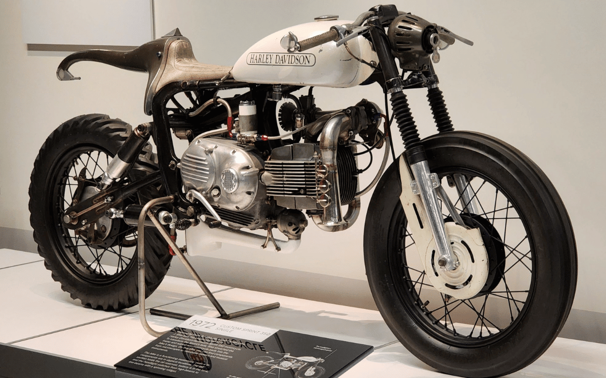Harley Davidson reconstructed using repurposed parts has a saxophone for an exhaust