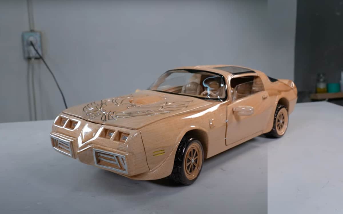 Watch as Pontiac Firebird Trans Am is whittled out of wood