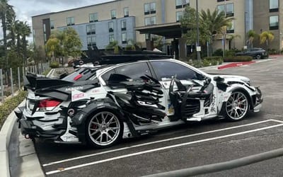 Honda in Arizona has been fitted with so many aftermarket wings it's almost impossible to get into