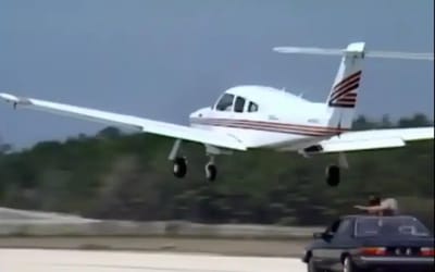 Mechanic repairs plane's landing gear mid-flight from Audi going at 90mph in jaw-dropping footage