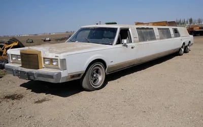 Watch these guys fix an abandoned Lincoln Town Car Limo