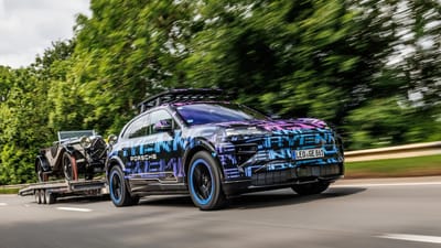 The Porsche Cayenne EV is already showing off, towing a 3-ton, 100-year-old classic car