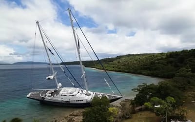 50-meter superyacht has been stuck on a reef since 2015 and locals are doing everything they can to salvage it