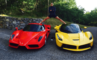 Zlatan Ibrahimovic stands on top of nearly $10,000,000 worth of Ferrari supercars as he shows off his unreal collection
