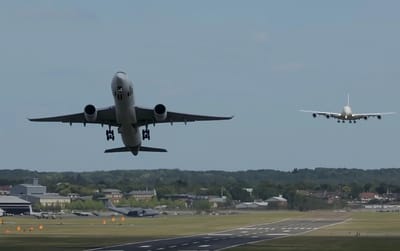 Airbus A350 goes for a very quick take-off with an Airbus A380 landing just moments after
