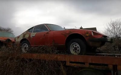 Old abandoned property is hiding a secret classic car in the yard