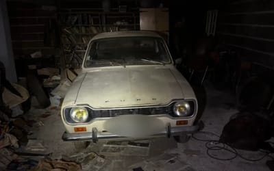 Explorer checking out abandoned home discovers an unexpected well-preserved rust-free Ford hidden in the garage