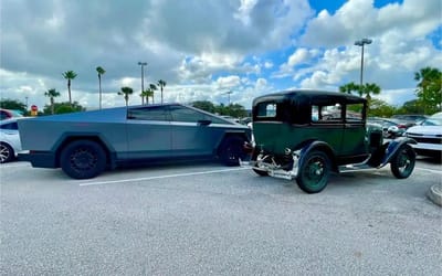 Awesome picture of Cybertruck parked next to Ford Model A shows side-by-side comparison of different eras