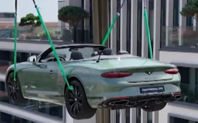 420k-bentley-craned-to-rooftop-michelin-starred-chef-restaurant-belgium