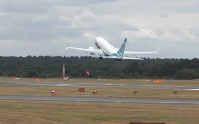 Boeing 737 MAX rockets into the sky to perform incredibly steep takeoff and turn