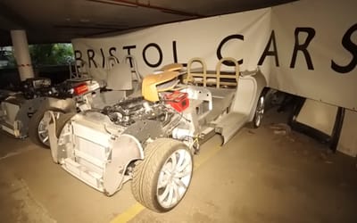 Guys dropped from great height to get into secret underground facility and in there found valuable car hoard that included an F1 car