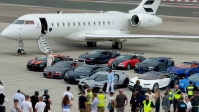 11 Bugatti hypercars shut down runway as millions of dollars' worth of vehicles put on a show