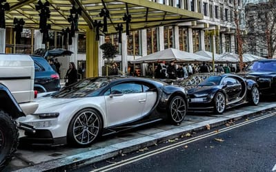 London streets witness the ultimate billionaire sandwich as Bugattis get boxed in by a 6x6 and a Rolls-Royce