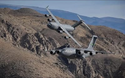 Exhilarating footage of two C-17s doing some extremely low level flying