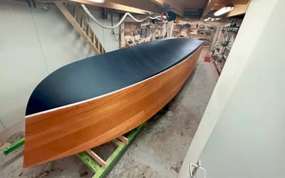 This man is building an all electric wooden Ferrari boat in his spare time