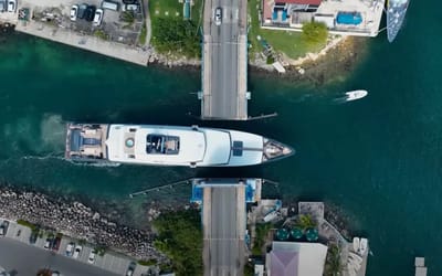 These guys risked everything to try navigate a $70M superyacht through the world’s most dangerous bridge