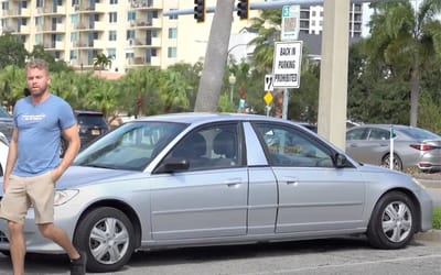 These guys were told back-in parking was prohibited at their car park so they made a car with two fronts to see the attendant’s reaction