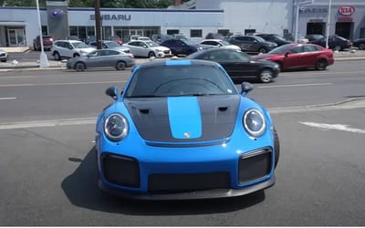 New Jersey car trader can’t contain his excitement as Michael Jordan’s 3,000 mile Porsche GT2 RS is brought into his dealership