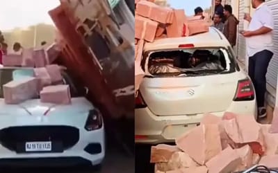 A truck full of bricks fell on top of a new Maruti Suzuki Swift and the car stayed fully intact