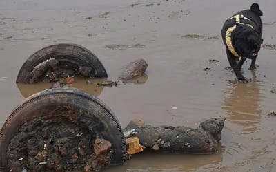 Internet attempts to identify this car left rotting on the beach but it’s really not easy