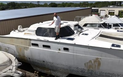 Couple buy abandoned catamaran sunk in hurricane before quickly realizing they’ve bought a wreck that’ll need thousands of hours of work