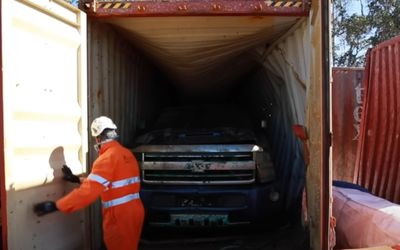 Two Chevy pickup trucks lost at sea in a shipping container but rescue operation unites owners with purchases two years on