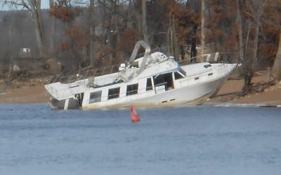 Abandoned boat on Wisconsin River for months racks up $44,000 in fines