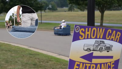 Man crashes a car meet by driving a fully functional, motorized living room couch and immediately upsets a Porsche owner