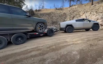 Tesla Cybertruck put to extreme towing test pulling a 10,000lbs Rivian 8,000ft up a Colorado mountain road