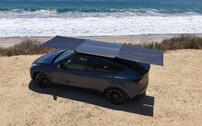 California company unveils world's first solar roof system that can be installed on a Tesla or any other EV so you 'never have to stop at a charger again