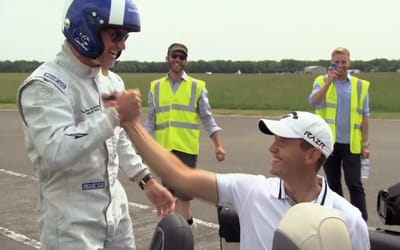 Pro golfer launches 178mph shot from 902 feet away and David Coulthard catches it in moving Mercedes
