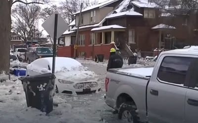 A 100-year-old water main flooded a Detroit street and turned the cars into ice cubes