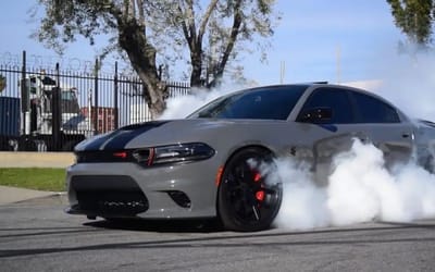 Shaq struggles to fit in a Lamborghini or Ferrari so after realizing he can fit in a Hellcat does something unbelievable with his cash