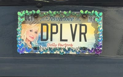 Working 9 to 5 is worth it just to flaunt this incredible custom Dolly Parton license plate