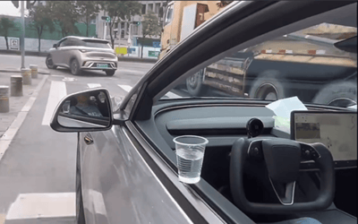 Tesla FSD was tested in China with the water cup challenge with mesmerizing results