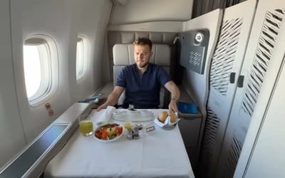 Travel vlogger filmed experience flying First Class and the airline threatened him not to post the footage
