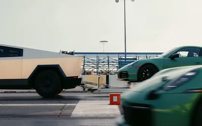 Tesla Cybertruck tows a Porsche 911 and still beats another 911 in a drag race while doing so