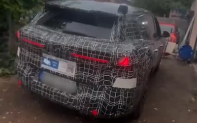 A BMW iX3 concept just pulled up to get its tires changed in Birmingham
