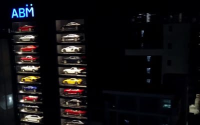 Inside Singapore’s 15 story car vending machine where you can buy a Lamborghini or a Bentley