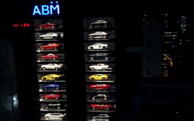 Inside Singapore’s 15 story car vending machine where you can buy a Lamborghini or a Bentley